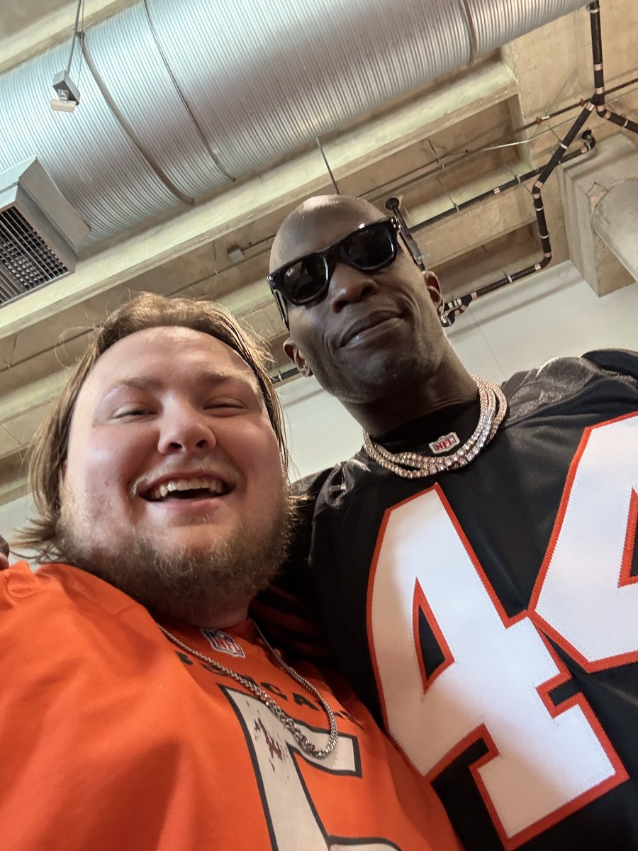 YTGonk's tweet photo. @ochocinco thank you so much for taking time to take a picture and talk to me today (I apologize I was drunk as shit😂). I got engaged the night before and then meeting you at the game the next day was like all of my childhood dreams becoming real! 💯 #Whodey #bengals https://t.co/8KuxFFnbKR