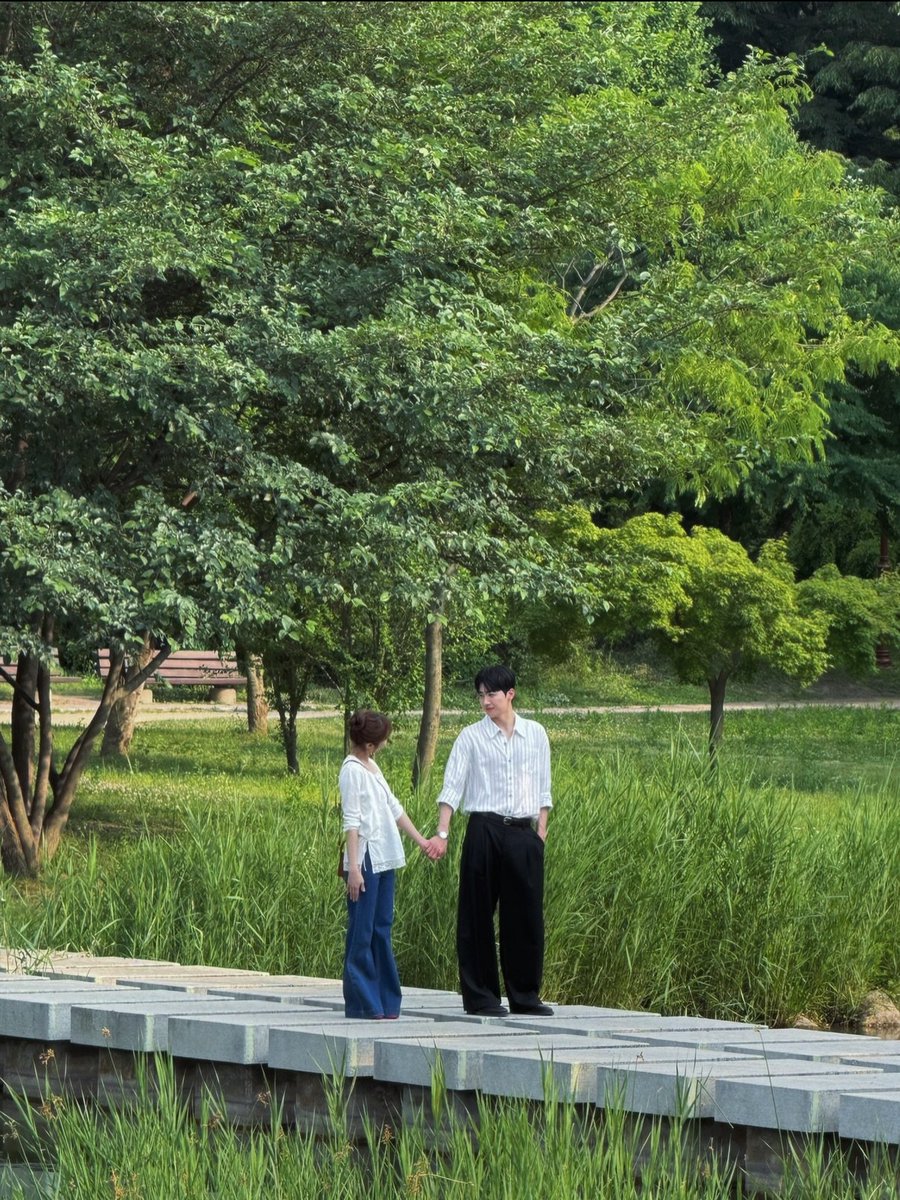 HYEJUNKlM's tweet photo. Posting these a bit late, but I couldn't let this summer go without sharing. Peeking behind trees, walking across the bridge, and holding hands under the green leaves. Thank you for tuning into our story! https://t.co/CJLBsNTnL8