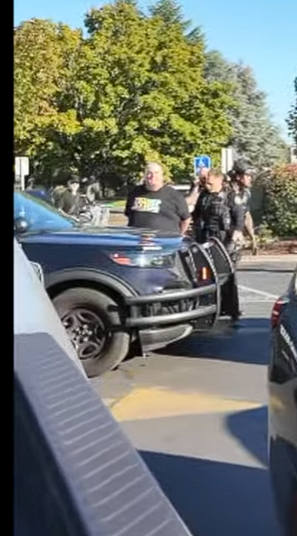 PTNewsNet's tweet photo. Michael James Duntley, aka Wider Spider Mike ,Age 59 of Milwaukee, Oregon  getting arrested for a warrant in regards to the theft of @THEGUYERSHOW 's phone.  Portland Oregon 9/20/2026 https://t.co/MvbxfIUnzJ