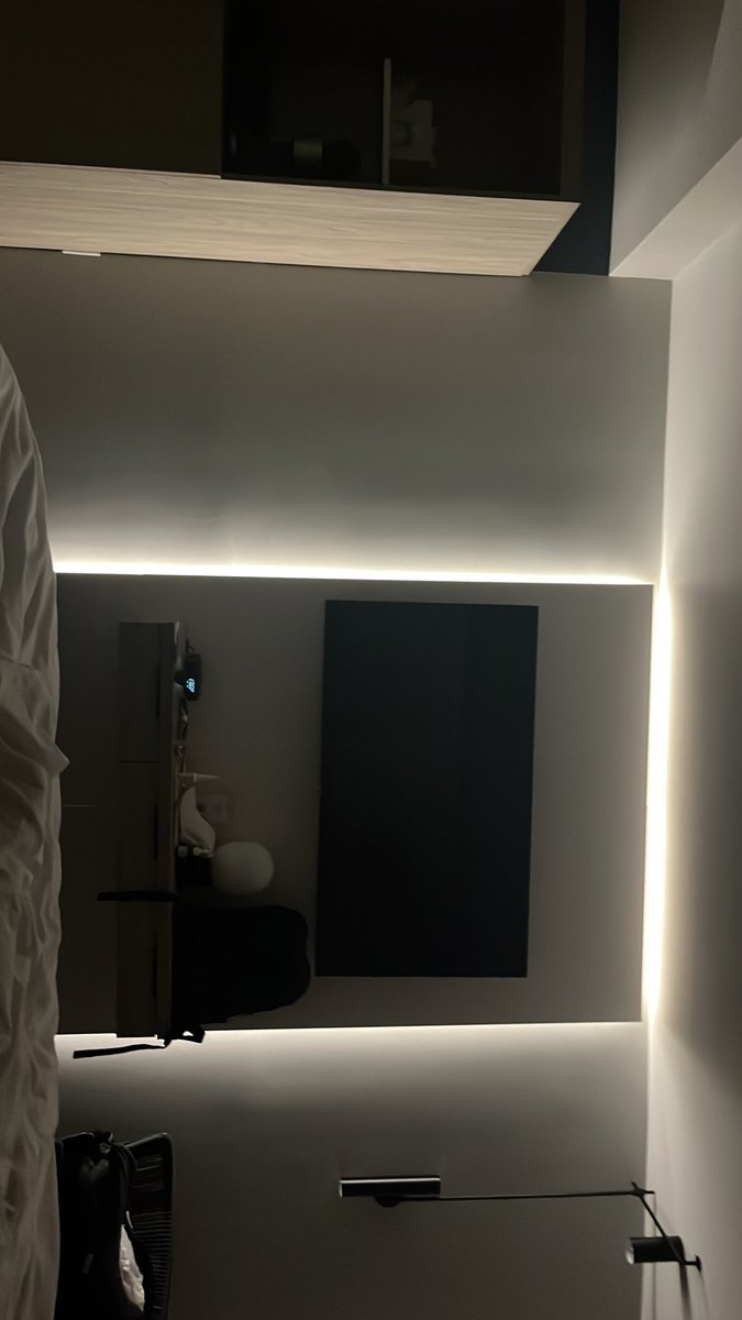 ryan_rossmango's tweet photo. not a single button that lets me turn off this light surrounding the TV. this hotel should be banned https://t.co/Td4Bjk6Nbn