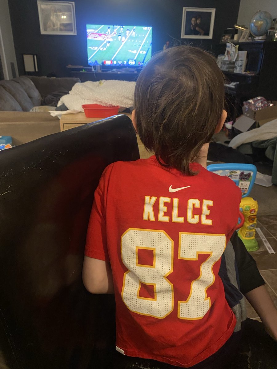 saskatchswiftie's tweet photo. The #Swifteffect on moms & sons isn’t talked about enough. We’ve been @CFL @sskroughriders season ticket holders for 15 years but I’ve had no interest in the @NFL till @taylorswift13 & @tkelce. Now we watch the @Chiefs together. ❤️💛 #chiefskingdom @newheightshow https://t.co/93EfP1oAKt