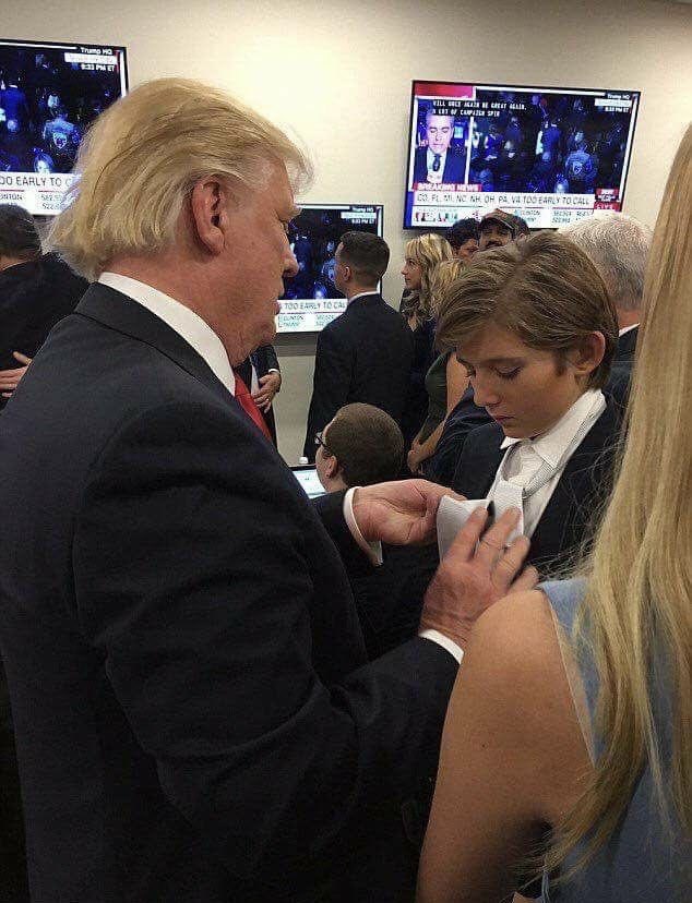 PlisskenPatriot's tweet photo. Presidential candidate Donald Trump fixes his son’s tie on Election Night. November 8, 2016. The election is still too close to call. https://t.co/zFQko97Pt3