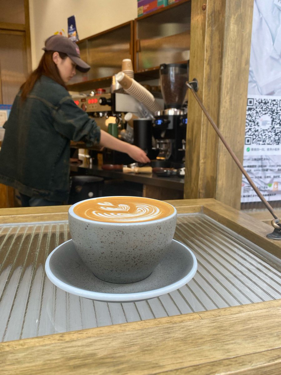 henrys30ophiaev's tweet photo. Quick street snap: a barista wiping mugs as sunlight hits the café patio, people walking by with takeaway cups. Small daily moments that feel warm and real. https://t.co/FIoMhEjPK2