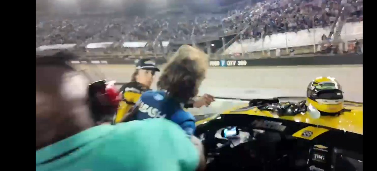 Dewboy13's tweet photo. @mmactenn @whatsundersteer Because the dude in the turquoise shirt had Ryan's right arm pinned back as he was pulling him to the ground.  That's the only reason Blaney went down. https://t.co/mmRlwuIe79