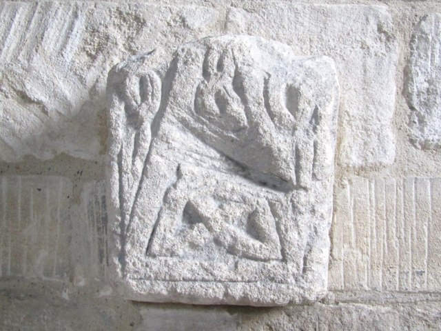 AngloSaxonPast's tweet photo. I Nearly Missed St Laurence’s Tiny Saxon Cross

I’ve just stepped into St Laurence in Bradford-on-Avon, Wiltshire, one of England’s rare surviving Anglo-Saxon churches.

I came expecting the tall, narrow building to do all the work. Instead, I stopped at a small carved cross fragment set into the stonework. It is easy to walk past, which somehow made it more affecting.

The church’s surviving fabric is Anglo-Saxon, while its precise origins have been debated. That little worn carving brought the place down to human scale for me: not simply “Saxon architecture”, but somebody shaping stone carefully enough for the marks to survive.