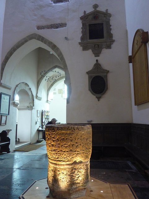 AngloSaxonPast's tweet photo. I nearly walked past Deerhurst’s farmyard-surviving Anglo-Saxon font

I’ve just stepped inside St Mary’s at Deerhurst, Gloucestershire, expecting the old stone church itself to hold my attention. Then I stopped at the font.

Its bowl is covered in tight spirals and plant-like bands, the sort of small carved detail that makes me forget to keep walking. Scholars even disagree over whether the bowl was originally made as a baptismal font.

What really stayed with me is its later life: the bowl was thrown out of the church and ended up in a farmyard before eventually returning.

I came for Anglo-Saxon architecture. I left thinking about one battered piece of stone that somehow made its way home.