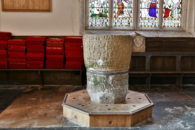 AngloSaxonPast's tweet photo. I nearly walked past Deerhurst’s farmyard-surviving Anglo-Saxon font

I’ve just stepped inside St Mary’s at Deerhurst, Gloucestershire, expecting the old stone church itself to hold my attention. Then I stopped at the font.

Its bowl is covered in tight spirals and plant-like bands, the sort of small carved detail that makes me forget to keep walking. Scholars even disagree over whether the bowl was originally made as a baptismal font.

What really stayed with me is its later life: the bowl was thrown out of the church and ended up in a farmyard before eventually returning.

I came for Anglo-Saxon architecture. I left thinking about one battered piece of stone that somehow made its way home.