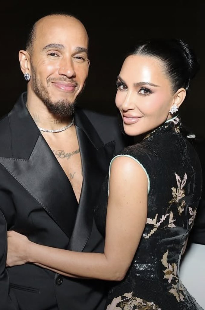 sa10nee's tweet photo. Lewis Hamilton’s response when asked why he has a Beyoncé name tattooed on his chest.

🗣️: “Nah, that’s not what it says.” Lewis fully reveals the whole tattoo, showing the text on it. “You can see for yourself. The whole text says ‘Dream Beyond Limits,’ not Beyoncé. There’s no way I can have Beyoncé’s name on my chest, lol. Although she was my crush when I was young, Kim wouldn’t allow me to have another woman’s name on my chest, even if I thought about it.”