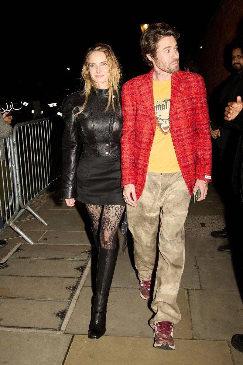 rebecca_fer12's tweet photo. Rebecca Ferguson and Rory St. Clair Gainer at Alexander McQueen SS27 Show, London Fashion Week, 09/20/2026. https://t.co/k5u36qE9tq