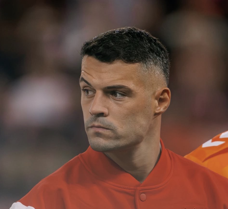TouchlineX's tweet photo. 🚨 𝗡𝗘𝗪: Granit Xhaka could face up to FIVE YEARS in prison over allegations that he obtained a Covid certificate despite not being vaccinated. 

The Lucerne public prosecutor has opened proceedings against Xhaka and a doctor from Lucerne.

— @RMCsport https://t.co/OgWRLsCwCj