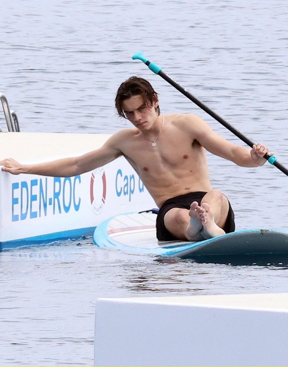 CrimsonHea4rt's tweet photo. Louis Partridge shows off shirtless body while paddle boarding in France https://t.co/GnmcP4mV8S