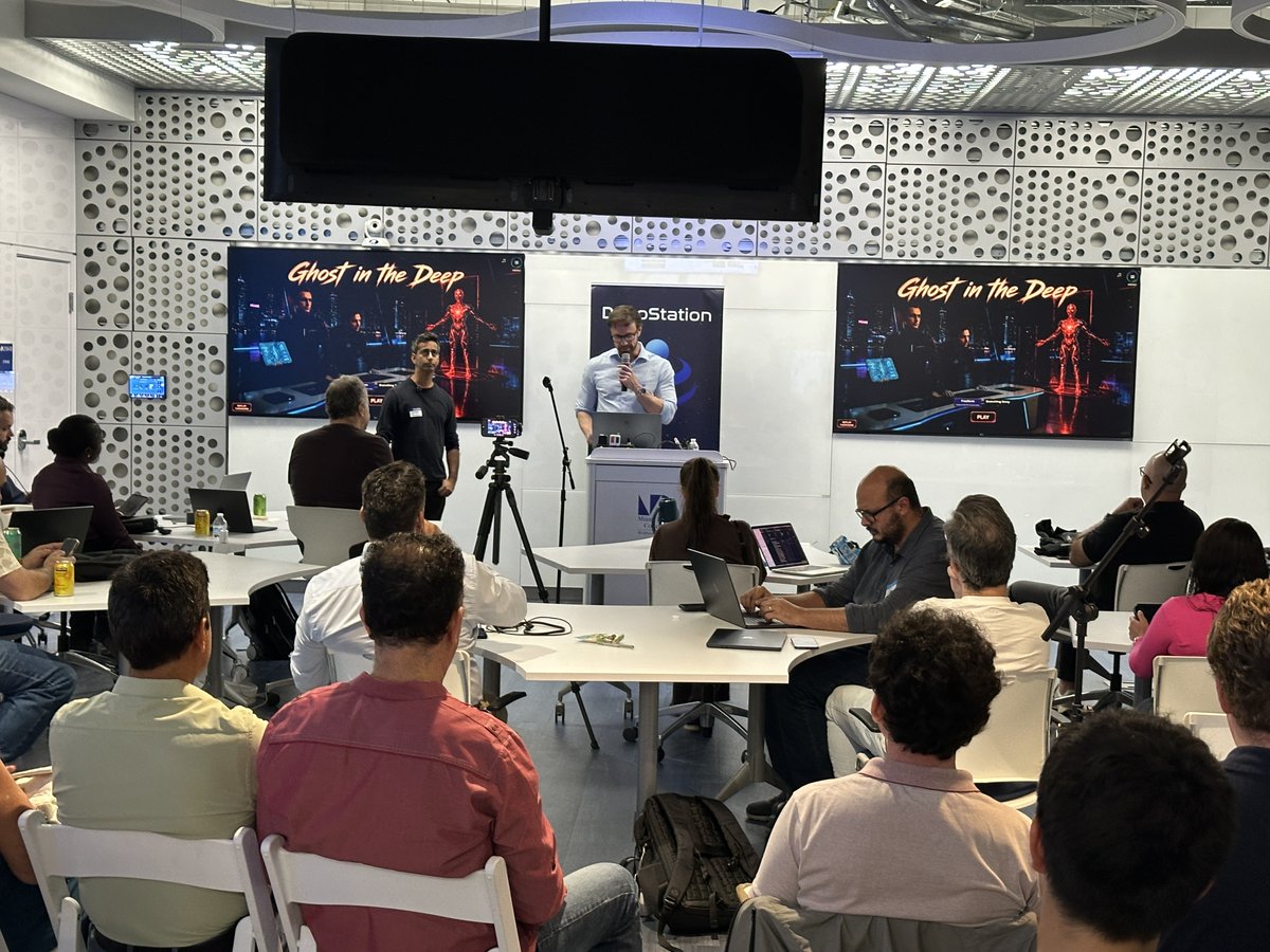 DeepStationAI's tweet photo. 🎙️ DeepStation is excited to share the post-event summary and photos from AI Demo Night at the AI Center at Miami Dade College, three live demos in one evening from OpenRouter, DreamForge, and Hugging Face!

🧭 Any model, any agent, a live tour of OpenRouter:
Carlos Arevalo (Product Designer, OpenRouter, formerly Apollo GraphQL and Flow) gave a live tour of OpenRouter: hundreds of models behind one API key, rankings that show what developers are actually building with, and media benchmarks that put every model on the same tricky prompt so quality, price, and speed sit side by side. Then guardrails that set the rules for spend, models, and providers, and Ori Harness launching Claude Code and Codex on any model with a single command.

🎮 DreamForge, a playable game that did not exist when the room walked in:
John Krajewski (Cofounder, CEO & CTO, DreamForge, formerly Electronic Arts) and Amar Shivdasani (Cofounder, COO & CFO, DreamForge, formerly Deloitte) introduced Forge, the AI that builds a game with you. One photo of the AI Center, Grant as the director, Sergey Brin as a visiting billionaire, a rogue AI called Aura, and the game that loaded was Ghost in the Deep, set in a 3D version of this room.

🤗 Hugging Face, from a Jupyter notebook to production without the hand waving:
Muntaser Syed (Lead GenAI Engineer, Insight Global, formerly NVIDIA) ran the whole pipeline live from a sixteen minute Colab notebook: DistilBERT fine tuned with LoRA, exported through ONNX, quantized to int8, two candidates at the release gate, one promoted and one blocked. On how models go rogue: "there's a human decision that either places or takes away the safeguards."

Key Takeaways:
🔹 Model choice proved swappable, not a commitment.
🔹 Making a game took a conversation and a photo of the room.
🔹 A release is a gate, and a person choosing to leave it in.

Thank you to Carlos, John, Amar, and Muntaser for building live.

Thank you to the AI Center at Miami Dade College for hosting our community.

Special appreciation to Arewa Ojelade and Joel Sola, who kept every part of the night turning.

🌉 Miami keeps showing up for this, and we keep building it for you.