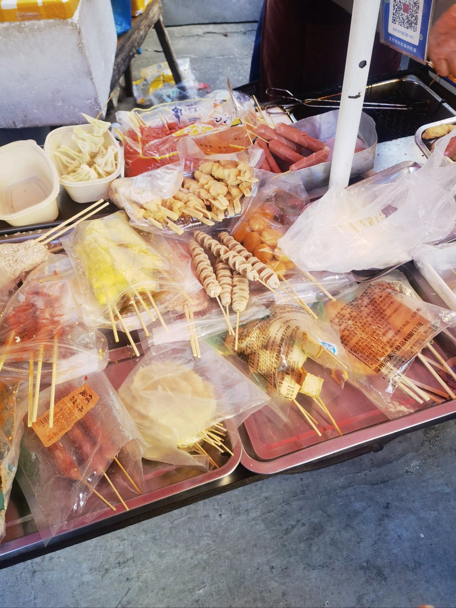 shedick403's tweet photo. Craving late-night street eats! This crispy fried skewer with spicy sauce hits different after a long day—street food hits hard for a reason https://t.co/F4ZrzBF7pI
