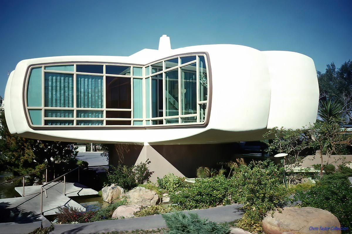 UncleWalt1971's tweet photo. Disneyland’s Monsanto House of the Future stood in Tomorrowland from 1957 to 1967, offering guests a glimpse of what suburban living might look like in 1986. Developed through a collaboration between Monsanto, MIT architects and engineers, and Disney, the experimental house was constructed largely from fiberglass-reinforced plastic, a radical idea at a time when plastics were still relatively uncommon as structural building materials.

Inside, the House of the Future was filled with space-age conveniences. Its “Atoms for Living Kitchen” featured an early microwave oven, push-button appliances, specialized refrigerated storage compartments, and an ultrasonic dishwasher built into the kitchen island. Instead of conventional water jets, the dishwasher demonstrated the possibility of using high-frequency sound waves to help clean plastic dishes. While microwave ovens eventually became household standards, ultrasonic dishwashing never caught on as a mainstream home appliance.

The bathrooms were created with the involvement of  industrial designer Henry Dreyfuss and featured molded plastic fixtures and built-in electrical conveniences. Among the futuristic touches was an electric toothbrush with a cord that retracted into the wall. The master bathroom even incorporated closed-circuit television that allowed residents to see visitors at the front door, an early vision of technology similar to today's video doorbells and home-monitoring systems.

Perhaps the greatest demonstration of the house’s plastic construction came when Disneyland tried to remove it in 1967. Demolition reportedly took about two weeks because the fiberglass-reinforced structure proved far tougher than expected. Wrecking balls reportedly bounced off portions of the shell, forcing workers to cut, pry, and crush the structure into smaller sections for removal.