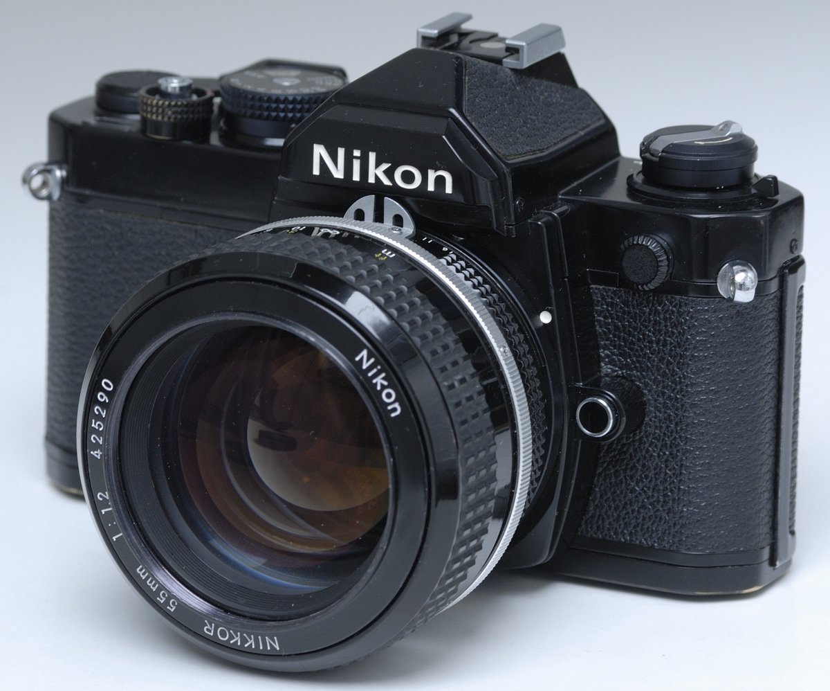 thecoers's tweet photo. juhoon got a nikon FM black film camera! seems like he's learning photography these days https://t.co/A3UVSPEhHY