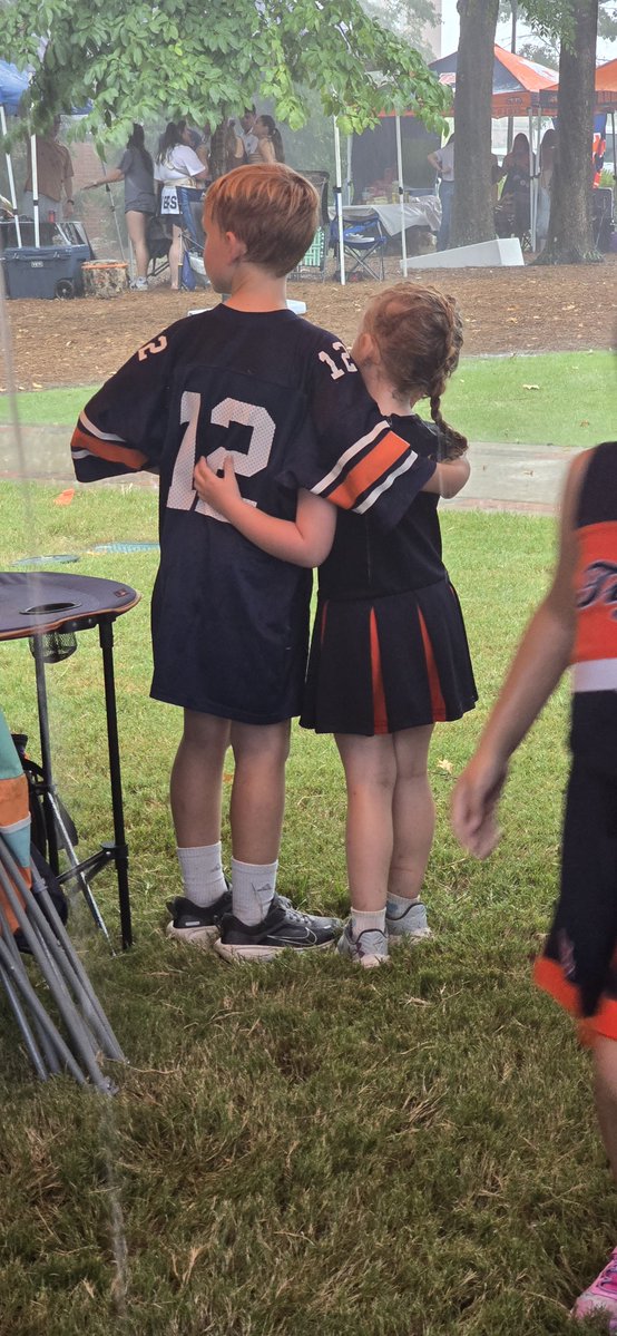 OnlyOneRomey's tweet photo. I'm not sure I've seen any picture that captures what being an Auburn fan is like these days. We're just huddled together waiting out the monsoon. https://t.co/2CRjMMP1q9