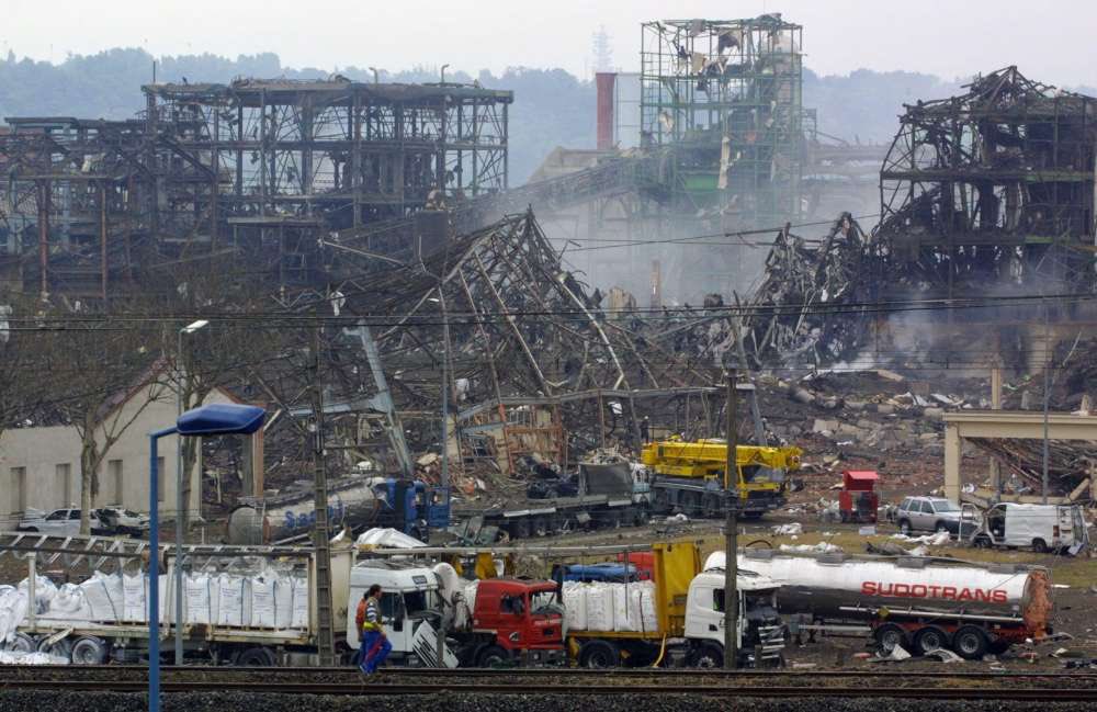 25YearsAgoLive's tweet photo. The AZF fertilizer factory in Toulouse, France explodes, killing 31 people and injuring 2,500. Two-thirds of all the windows in the city are shattered, and at least 70 people are blinded. 

The total cost of damage is estimated to be €1.5 billion. 

France’s Minister of the Environment, Yves Cochet, says that the explosion “may have been a terrorist attack” and identifies the suspected perpetrator as Hassan Jandoubi, a Tunisian contractor who was killed in the blast. 

Authorities are suspicious, as Jandoubi’s girlfriend begins destroying evidence immediately, but they are able to ascertain that he had been gaining “Islamic fundamentalist radicalization.”