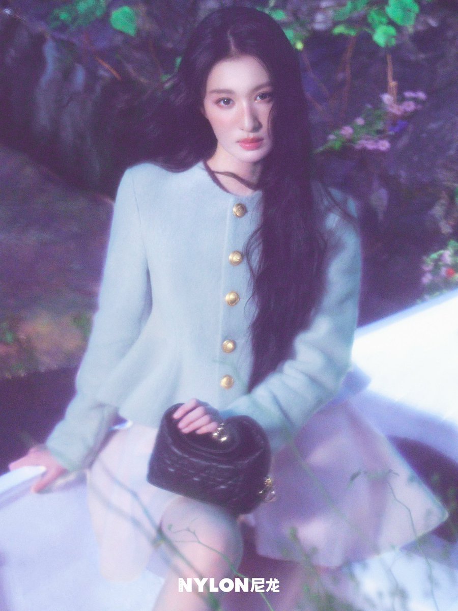 whcuran's tweet photo. Ethereal elegance under soft purple light.

Long dark hair cascading, a soft mint jacket with golden buttons, and a quiet gaze that holds the whole frame — pure NYLON magic.

Which one is your favorite from the set? ✨ https://t.co/9ue5aZMg6A