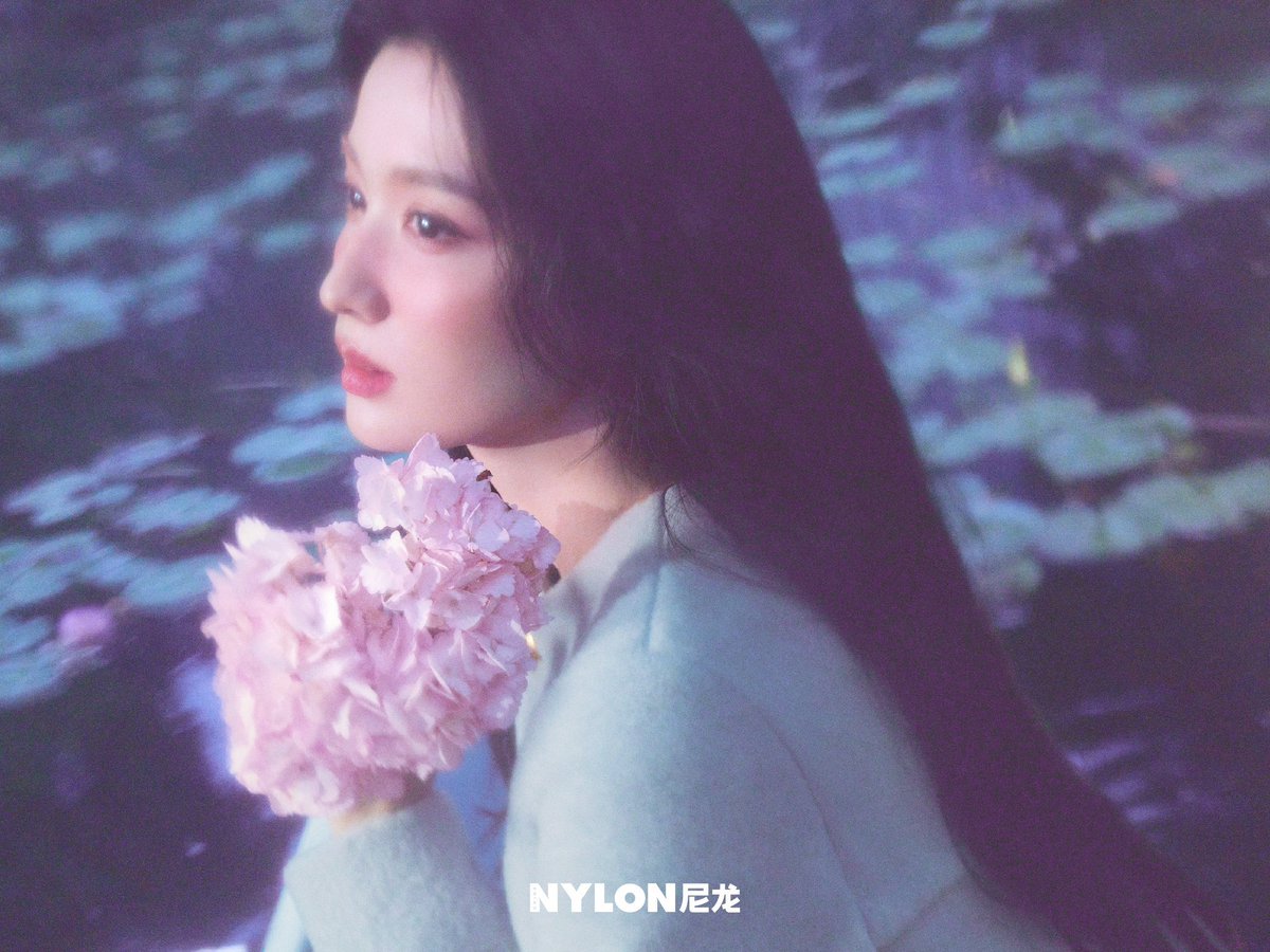 whcuran's tweet photo. Ethereal elegance under soft purple light.

Long dark hair cascading, a soft mint jacket with golden buttons, and a quiet gaze that holds the whole frame — pure NYLON magic.

Which one is your favorite from the set? ✨ https://t.co/9ue5aZMg6A