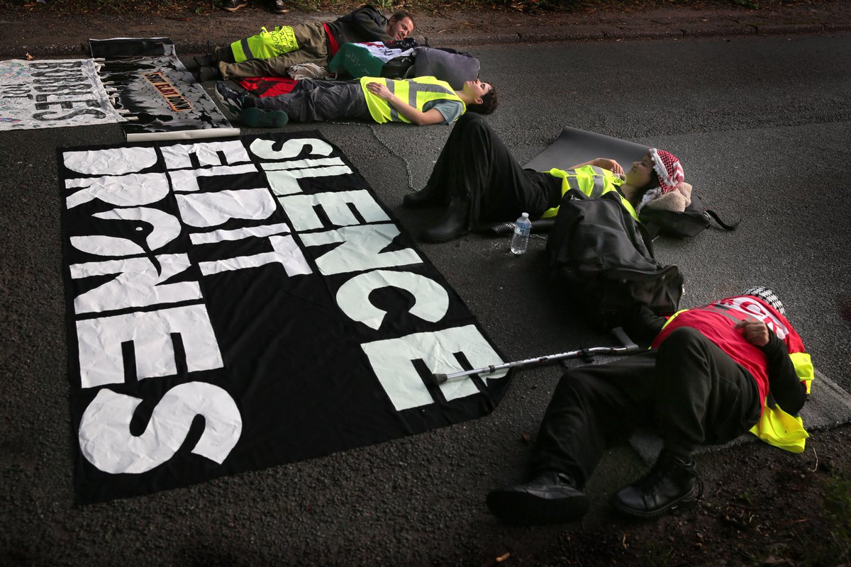 SilenceElbit's tweet photo. BREAKING: Nine arrested after they shut down an Elbit drone factory in Shenstone, Staffordshire.

By putting our bodies in the way, we can shut Elbit down.

With hundreds making a small sacrifice, Elbit would never be able to open again in Britain. https://t.co/JNHdl6wYCm