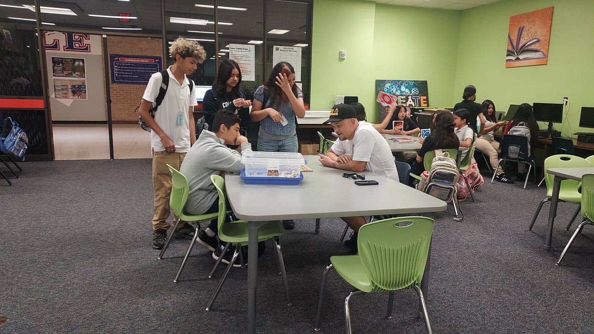 OlleLibrary's tweet photo. Teachers taking the time before school to to interact with our students outside of the classroom!  What an amazing thing to see how competitive they are.  #MoreThanBooks @OlleMightyOwls @Alief_Libraries https://t.co/7jZegAFbUT