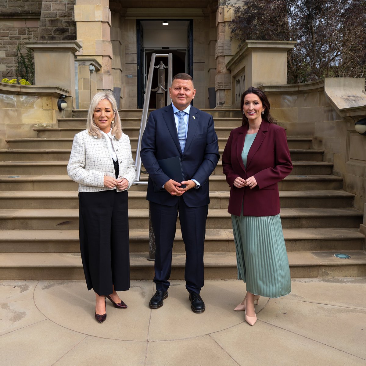 niexecutive's tweet photo. First Minister Michelle O’Neill and deputy First Minister Emma Little-Pengelly have met with the Ukraine Ambassador to the UK, Valerii Zaluzhnyi, at Stormont Castle.
They discussed the situation in Ukraine and support for Ukrainian refugees here. https://t.co/h4o3pceESK