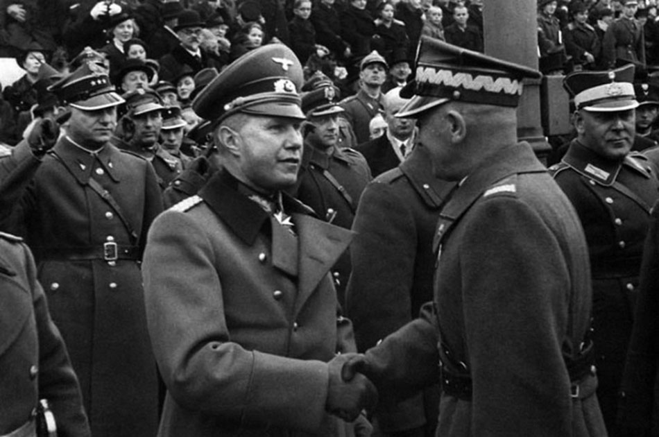 Olle_Smith's tweet photo. Red Army was a Wermakht allie 
Here, Red Square, May 1, 1941

Smiling, a handshake, and a good meal at the end of the day 

Or do you need to see how the Red Army raises its right hand in salute to Wermakht officers? We have those photos for you, you just need to come to Ukraine (no worries, it's safe here; Russia only destroys military objects, so you are good)