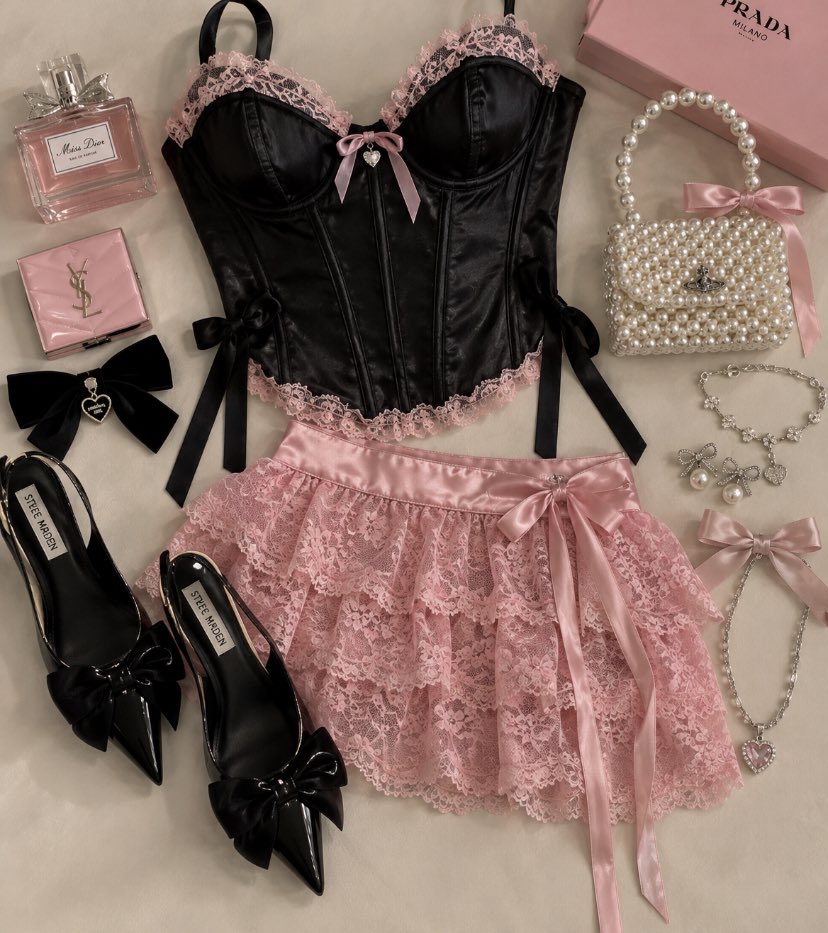 PinkPrivilege5's tweet photo. Coquette era: black lace corset, pink ruffles, bows everywhere. https://t.co/EDKhNZVumY