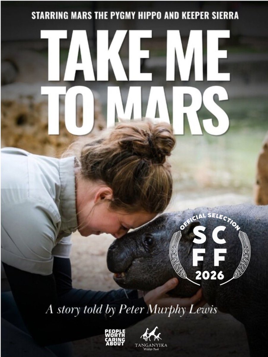 MarsTheHippo's tweet photo. Update from @TanganyikaPark regarding the Mars documentary “TAKE ME TO MARS” 

Back in August we told you the documentary was heading out to festivals and streaming platforms, and that all we could do after that was wait.

We got our first yes!

Take Me to Mars is an Official Selection at the 2026 Salt City Film Fest. 

There's a laurel with his name on it now. The real kind, the kind filmmakers frame.

And look at the poster: starring Mars the pygmy hippo and keeper Sierra. He's the lead. Our founders, our keepers, the people who drove across the country to meet him, they're all supporting cast in a movie about a hippo.

Mars, for his part, is completely unbothered. He's been busy having his first mornings out on the habitat by himself while Posie gets used to being a little farther away.

The festival runs September 26 in Wichita. We don't have our screening block yet, and the second we do, you'll hear it here first.

Thanks for being part of Mission Mars. A hippo born in Goddard is on a film festival list because a whole lot of you decided he mattered.