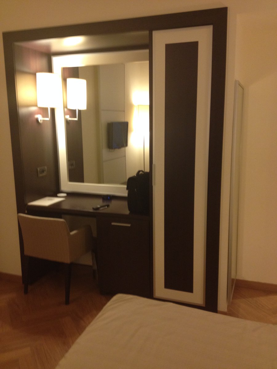 systemlayer's tweet photo. New room, same brutal workday. At least the upgrade hits just right. 💻🔥 #BusinessTravel #HotelLife" https://t.co/DZ1ONnUGme