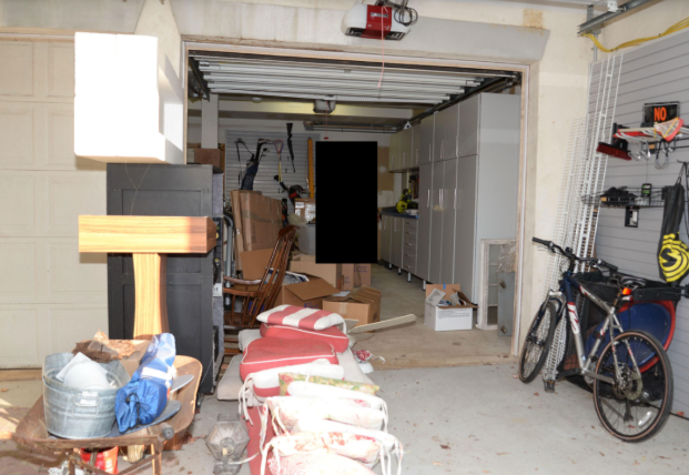 ItsYourGov's tweet photo. And here's where the "most secure documents in America" ended up: a cluttered garage with bikes, cushions, and yard tools. Wide open. No SCIF. No safe. No restricted access. Anyone who walked in could have touched it. https://t.co/FBs63QyIwM