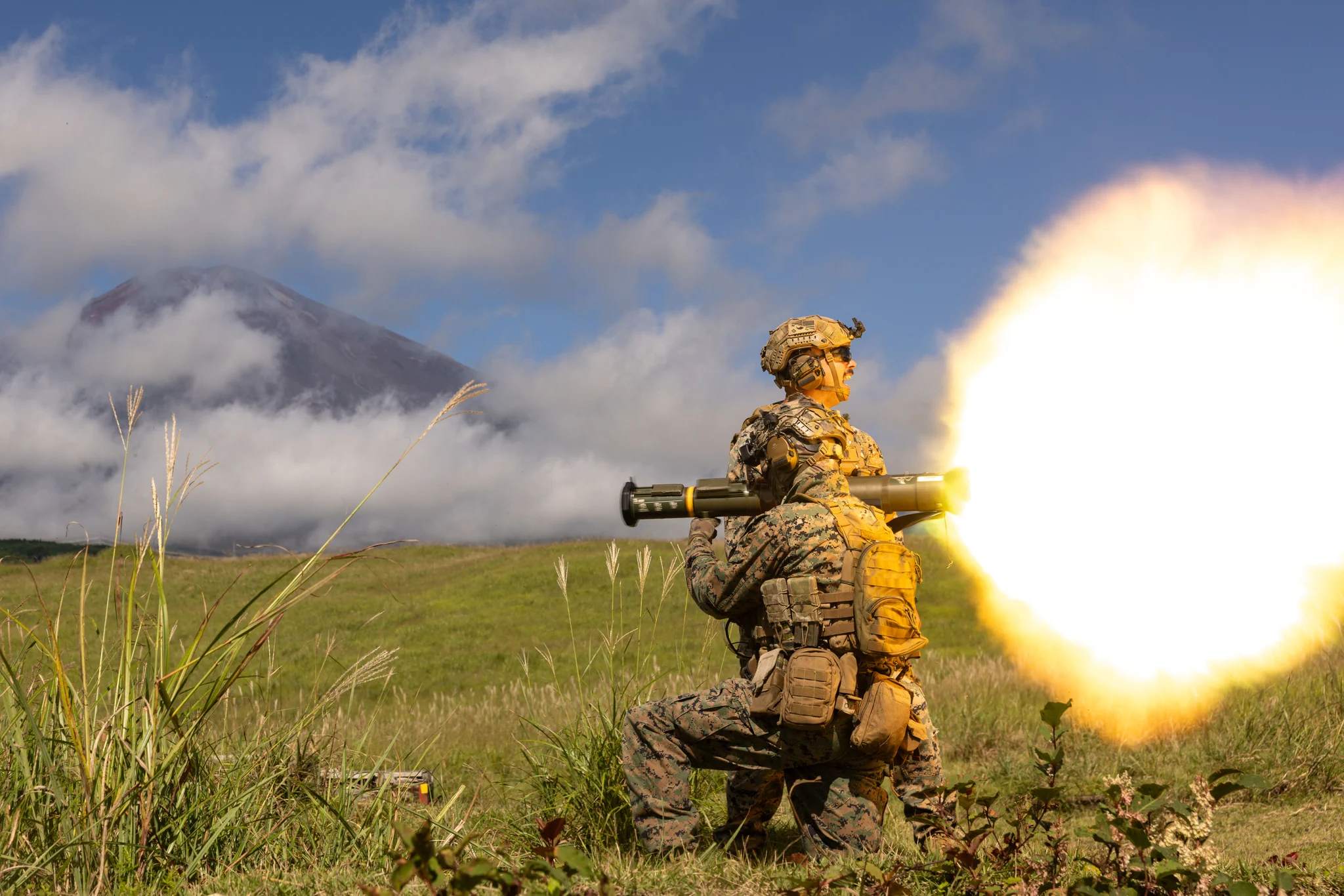 U.S. Marine Corps Cpl. Luke Slater, front, a machine gunner with 12th Littoral Combat Team, 12th Marine Littoral Regiment, 3rd Marine Division, fires the AT4 84mm light anti-armor weapon at Combined Arms Training Center,\u202FCamp Fuji, Japan, Sep. 14, 2026.\u202FBy training with weapon systems such as the M3E1 Multi-Role Anti-Armor Anti-Personnel Weapon System and AT4, Marines enhanced their tactical proficiency and overall combat readiness lethality in urban and open environments. Slater is a native of Missouri. (U.S. Marine Corps photo by Lance Cpl. Camila Garibay)
