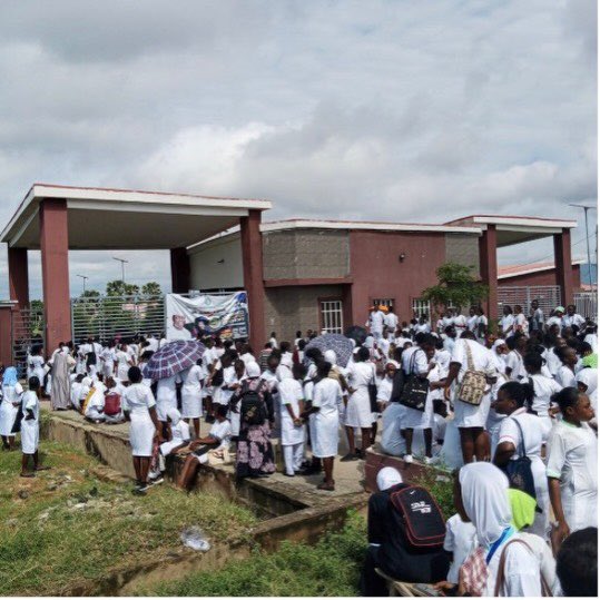 instablog9ja's tweet photo. Nursing students protest in Taraba after hoodlums break into female hostel, r@pe student

Students of the Taraba State College of Nursing Sciences, Jalingo, protested on Monday following an att@ck on one of the female hostels located outside the institution’s premises.

The att@ck reportedly occurred in the early hours of Monday, with hoodlums ste@ling students’ phones and other valuables and allegedly r@ping one of the female students. The student, whose identity was withheld, was taken to a private hospital in the Mile 6 area of Jalingo for treatment.

A student union official, who spoke anonymously, said it was the second att@ck on the students’ hostels within two weeks.

“Yesterday night, the hoodlums came in their numbers and attacked one of the female students’ hostels. They r@ped one of the students and also carted away phones belonging to the students and other valuables.

“They also c¥t one of the fingers of the student after r@ping her. She is now on admission at a private hospital located at Mile 6 area in Jalingo.

“When the first att@ck happened last week, we complained to the school authorities and the Commissioner of Tertiary Education visited the college and promised that security measures would be put in place in all the hostels, but nothing was done,” he said.

The official said the college has seven hostels, one for males and six for females, but all are located outside the school premises without adequate security.

The Provost, Dr Dorcas Dugule, acknowledged the report, saying, “I am on top of the issue. I will not speak; please give me time.”

The Taraba State Police spokesperson, Victor Mshelizah, confirmed the attack but said he was unaware of the r@pe allegation.

“Yes, such incident happened in the early hours of today. Some hostels were burgled and phones were st%len. But I cannot confirm the r@pe allegation because I haven’t seen the victim,” he said, adding that officers were heading to the school.