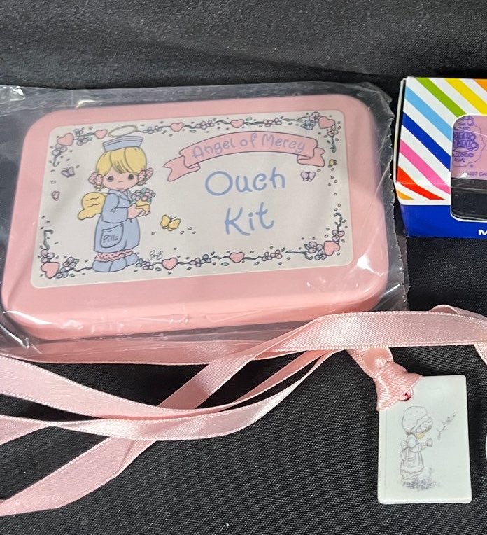 yunfettizsu's tweet photo. Precious moments “Angel of  mercy” plastic first aid box. Handy &amp; cute! ⋆˚⊹ https://t.co/C93hAAVIir