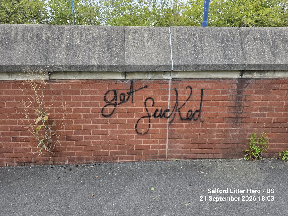 LitterGrockle's tweet photo. Hey @SalfordCCHelp can you have someone tinker with the graffiti on the red brick wall where the Eccles Metrolink line goes dowm under Ladywell Roundabout.

It's back of the Range at west one retail park.

Further down same area is a quantity of broken glass that needs removal... If the small street sweepers are good at reversing then one would be ideal!

Why is the area open at the Ladywell tram stop end when it's blocked off at the roundabout end? 🧐 Is a litter hotspot