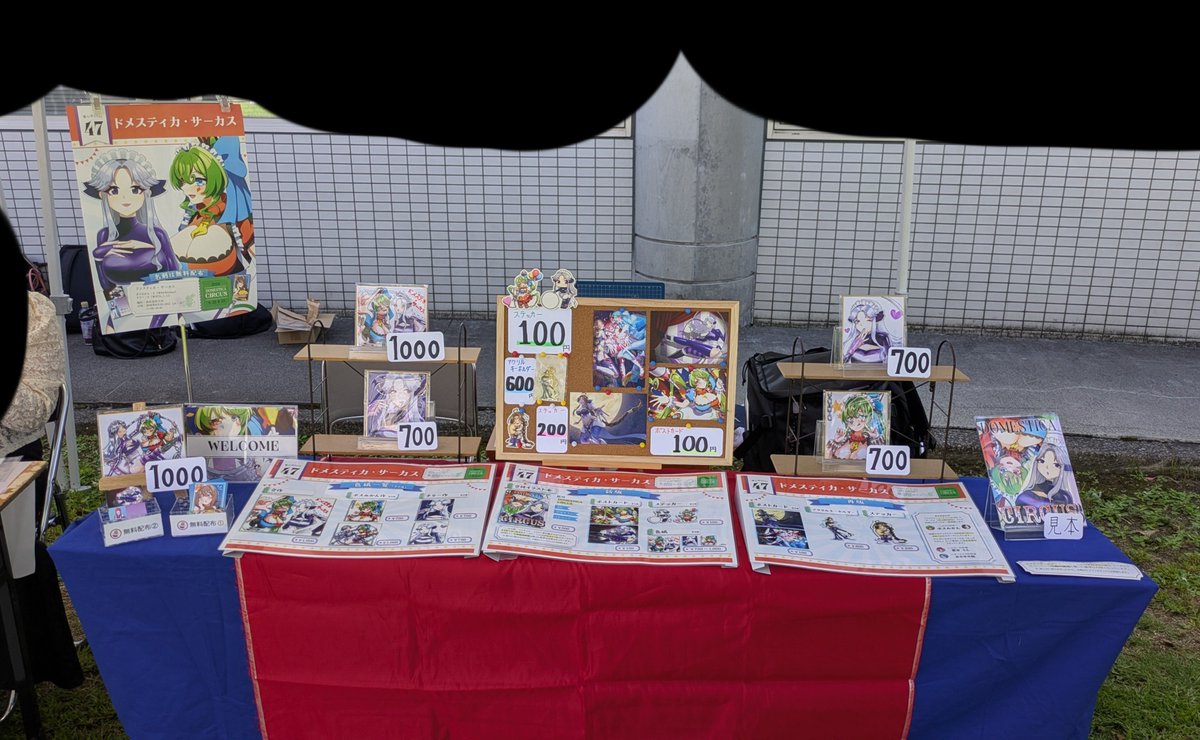 BABmikan's tweet photo. 少しオーバーして設営完了しました！
本日はよろしくお願いします！！

※グッズは風飛ばされ防止のためこちらで保管してます

 #響心祭2026 https://t.co/HSmcXFieES