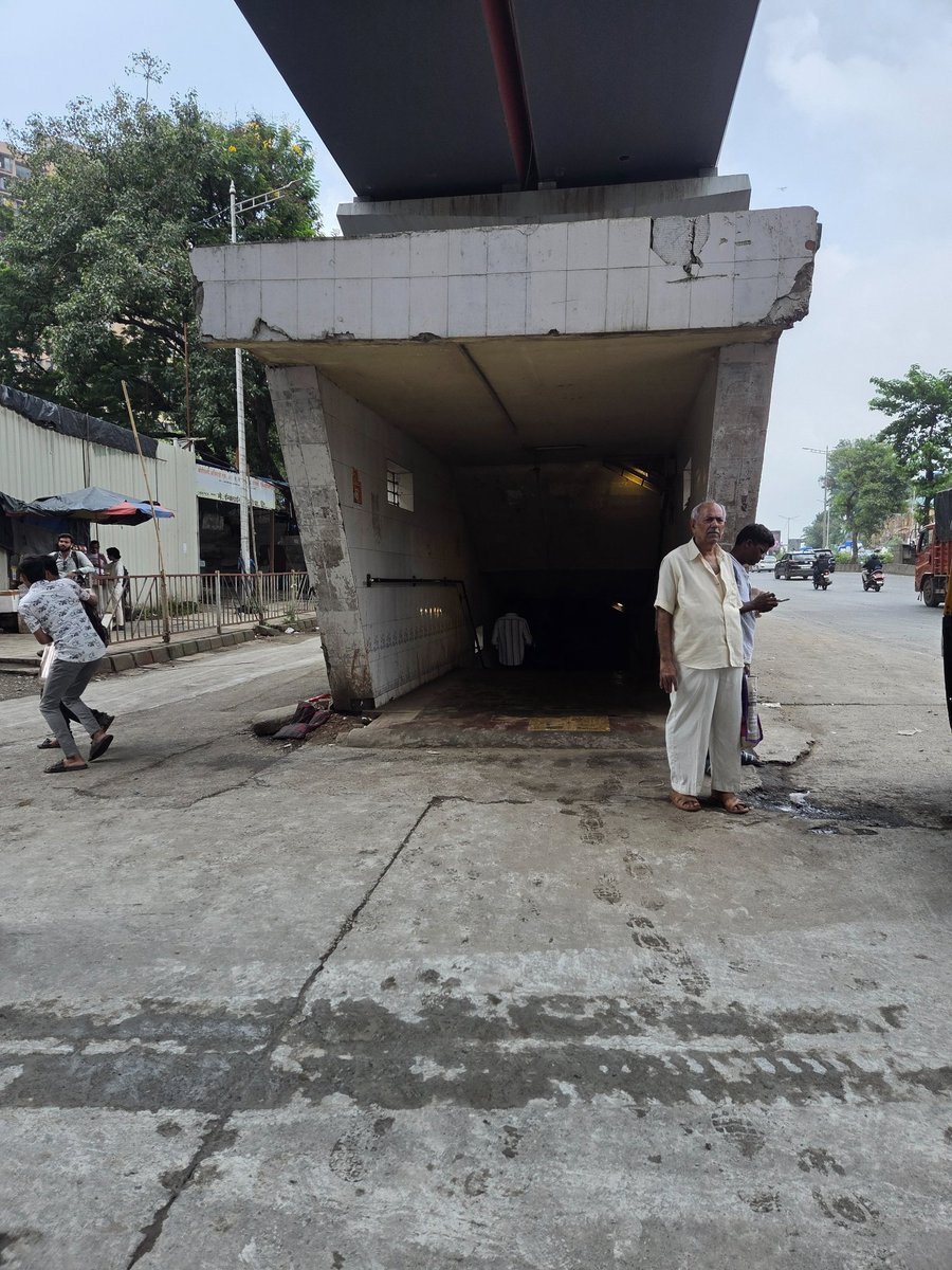 AmitPatil2023's tweet photo. The pedestrian underpass next to **Devipada Metro Station, Western Express Highway** is in a terrible state—stagnant dirty water, mud, seepage and damaged flooring are making it unsafe for pedestrians.

 @mybmc @mybmcWardRC  Take urgent action to clean, repair and maintain. https://t.co/5mYci3LPMf
