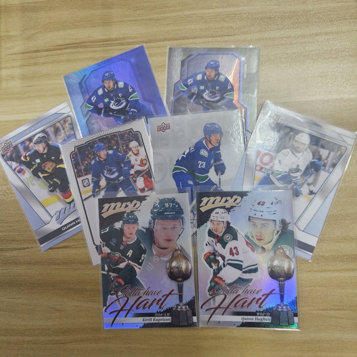 goruinix's tweet photo. Thank you so much, @voila__bns 💙💙 My canucks cards + 9743 cards arrived safely 🥹💙 #voila__bns https://t.co/U7xfgWmGuQ