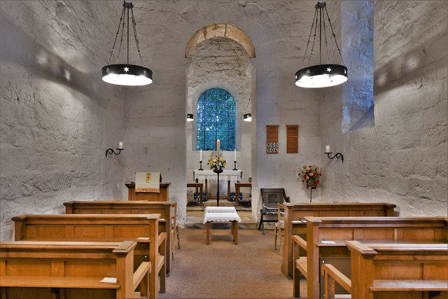 AngloSaxonPast's tweet photo. Escomb’s thick stone walls changed how I pictured Anglo-Saxon life
I stepped into Escomb’s Anglo-Saxon church in County Durham expecting something small and delicate. Instead, the nave feels remarkably solid, with rough pale stone rising around a tall, narrow arch into the chancel.
I stopped there rather than walking straight through. The scale suddenly made the building feel less like an illustration in a history book and more like a real room people once had to build, enter and use.
What stayed with me was the masonry itself. Much of Escomb was built using stone reused from the nearby Roman fort at Binchester. Two periods I usually keep neatly separated were sitting together in the same walls.