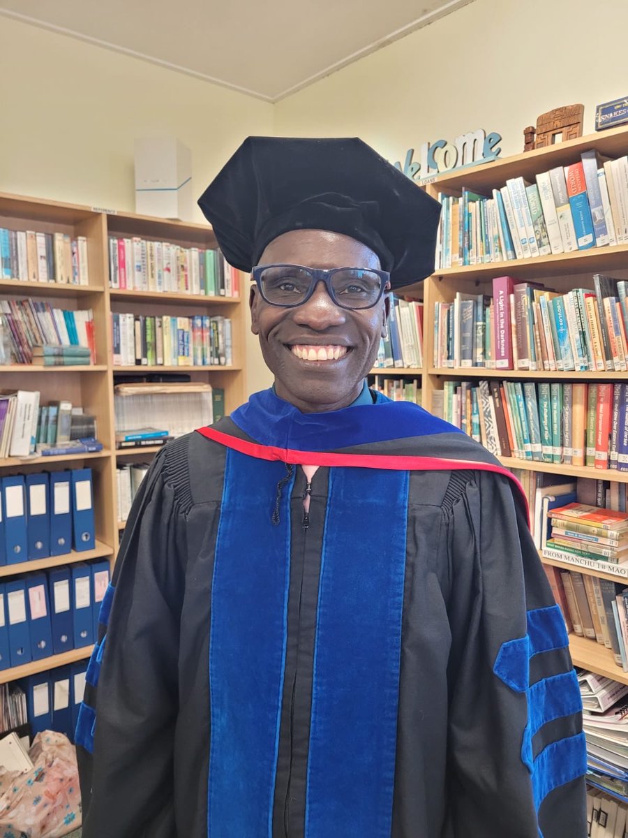 OuleCalvin1's tweet photo. A miracle! 
A boy raised by a poor crippled grandmother and blind mother in rural Uganda becoming a highly educated man, is nothing but a miracle. Look what GOD has done! I dedicate my PhD to SERVING others. I thank my family, friends and Southeastern University for their support https://t.co/kr61a7MRDZ