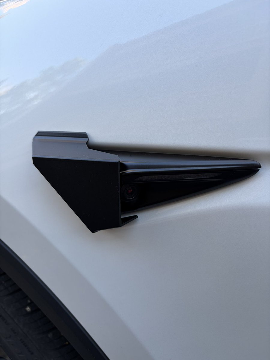 jandatesla's tweet photo. Can’t wait to see what these puppies can do, @RepeaterShield ! These are the repeater shields. Installing them on your Tesla Model 3, Model Y, or Model YL helps keep water from collecting on the repeater camera lenses, preventing visibility errors while FSD is active or while you’re driving manually.