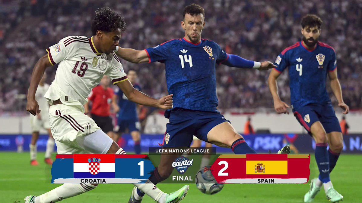 A player in a white jersey with the number 19 contests the ball against a Croatian player wearing number 14, while another player in a blue jersey with number 4 approaches during a UEFA Nations League match. The scoreboard graphic shows "CROATIA 1 - SPAIN 2 FINAL" under the "UEFA NATIONS LEAGUE GOŁAZO!" banner, supporting the post's claim about Spain's strong squad performance.