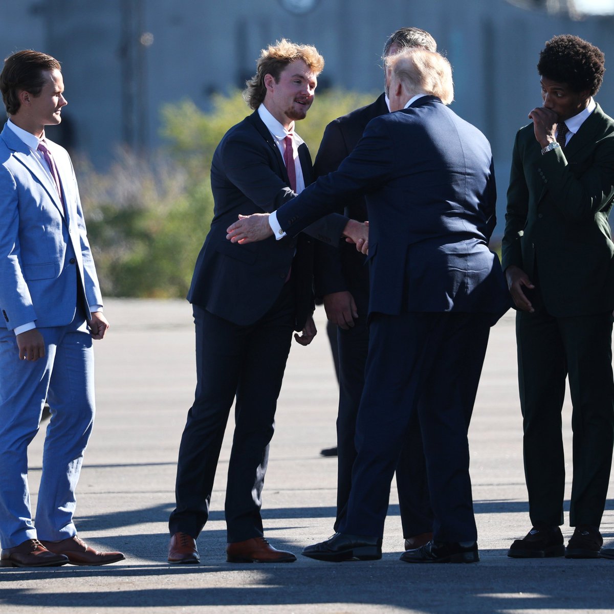 NickAdamsinUSA's tweet photo. President Trump greets Ravens players Tyler Loop, Ryan Eckley, Nicholas Moore, and Marlon Humphrey at the airport.

This could be the year Lamar Jackson wins it all for the Baltimore Ravens! https://t.co/FHSQQsCyrM