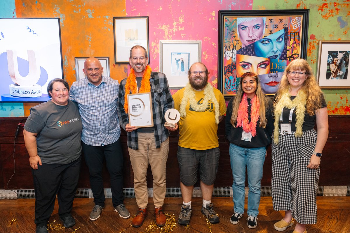 proworks's tweet photo. Yes, those are feather boas. Yes, that's an award. 🏆

Umbraco gave us "The Stars, Stripes &amp; AI" for our work with Mold Inspection Sciences: Their traffic is up 80%, and 2026 is their best year ever.

How we got there: https://t.co/4s9K196ZhX

#Umbraco #UmbracoAI #h5yr https://t.co/Gsz9bVGPtC