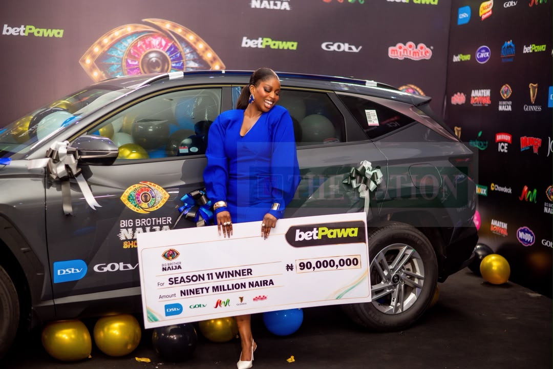 TheNationNews's tweet photo. PHOTOS: BBNaija season 11 winner Temi Nkem poses with new car, ₦90 million cheque gift during prize presentation

Source: The Nation, Lekan Ale
---
Follow us for more breaking news and video content 

For more stories: https://t.co/GX9bhs3WZ5 https://t.co/Yy53WvvNqx