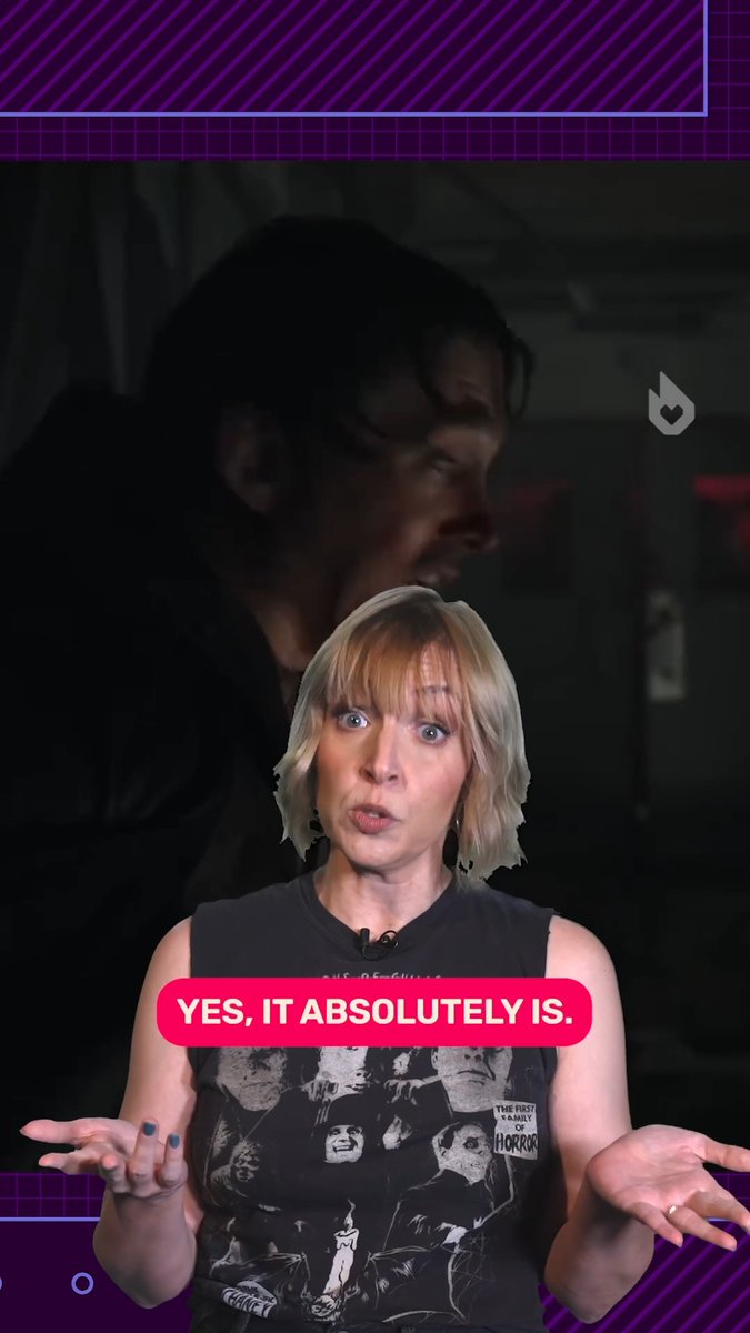 A blonde woman in a black sleeveless graphic shirt stands with her hands raised in a shrugging gesture, while text across her torso reads "YES, IT ABSOLUTELY IS." Behind her, a dark scene from the Resident Evil film shows a character with dark hair, relating to the post's discussion about hidden Resident Evil game connections in Zach Cregger's work.