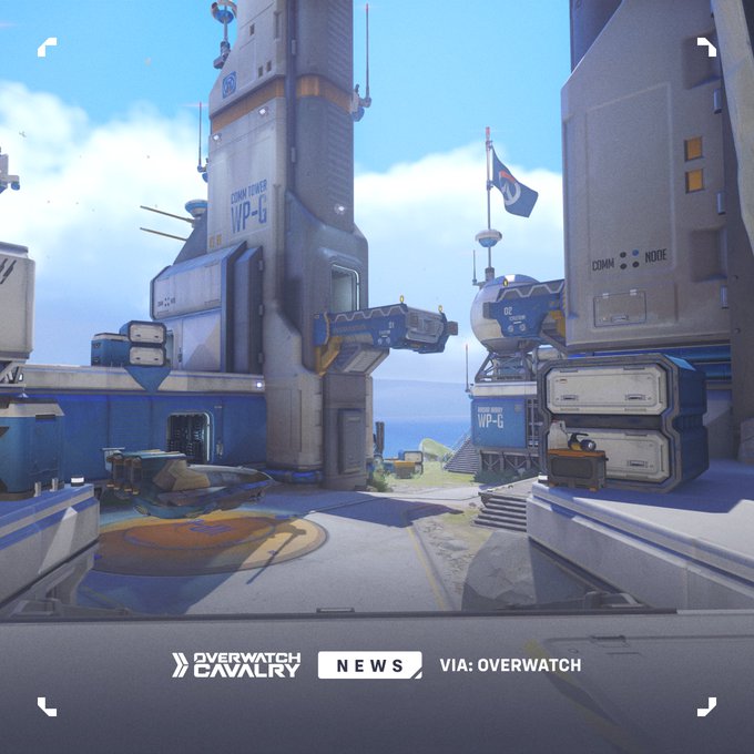 A screenshot from the video game Overwatch showing a futuristic blue and white base labeled 'CONTROL TOWER WP-G', with 'OVERWATCH NEWS VIA: OVERWATCH' displayed at the bottom.