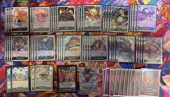 A One Piece TCG deck spread featuring multiple copies of cards including Nami, Time Tame Chopper, Jinbe, Jewelry Bonney, Smoker, Smiley, Hajrudin, Monkey D. Luffy, Blocker Sanji, and "Mr. Tom" leader card, showcasing a 4-0 competitive list that the player recently updated by switching leaders.
