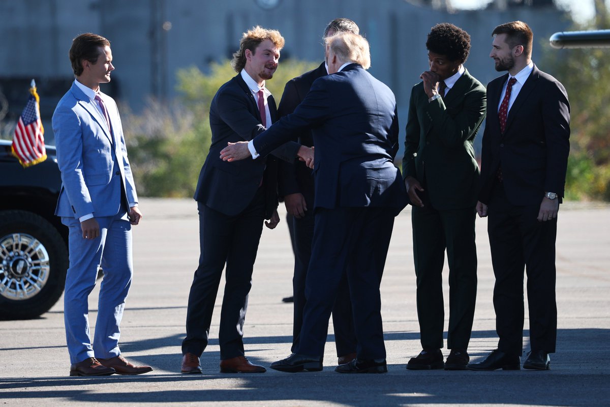 atrupar's tweet photo. Trump and his gigantic wagon greets Ravens players Tyler Loop, Ryan Eckley, Nicholas Moore, and Marlon Humphrey

(Win McNamee/Getty) https://t.co/dxxRXl0Bw8
