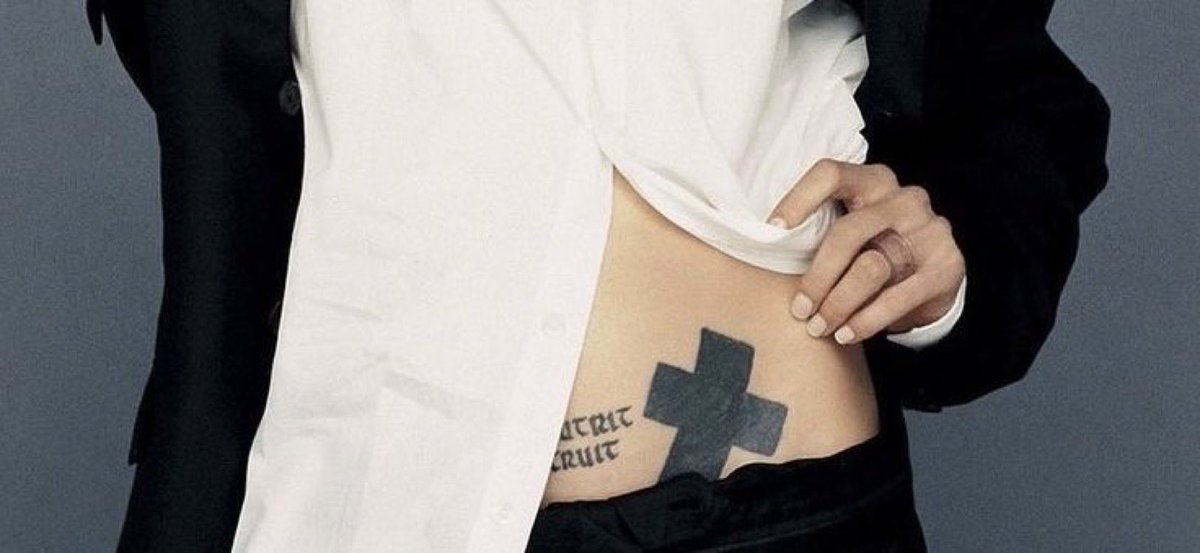 welcome_jpeg's tweet photo. angelina jolie’s ‘what nourishes me destroys me’ tattoo https://t.co/5jMfaXVLWo